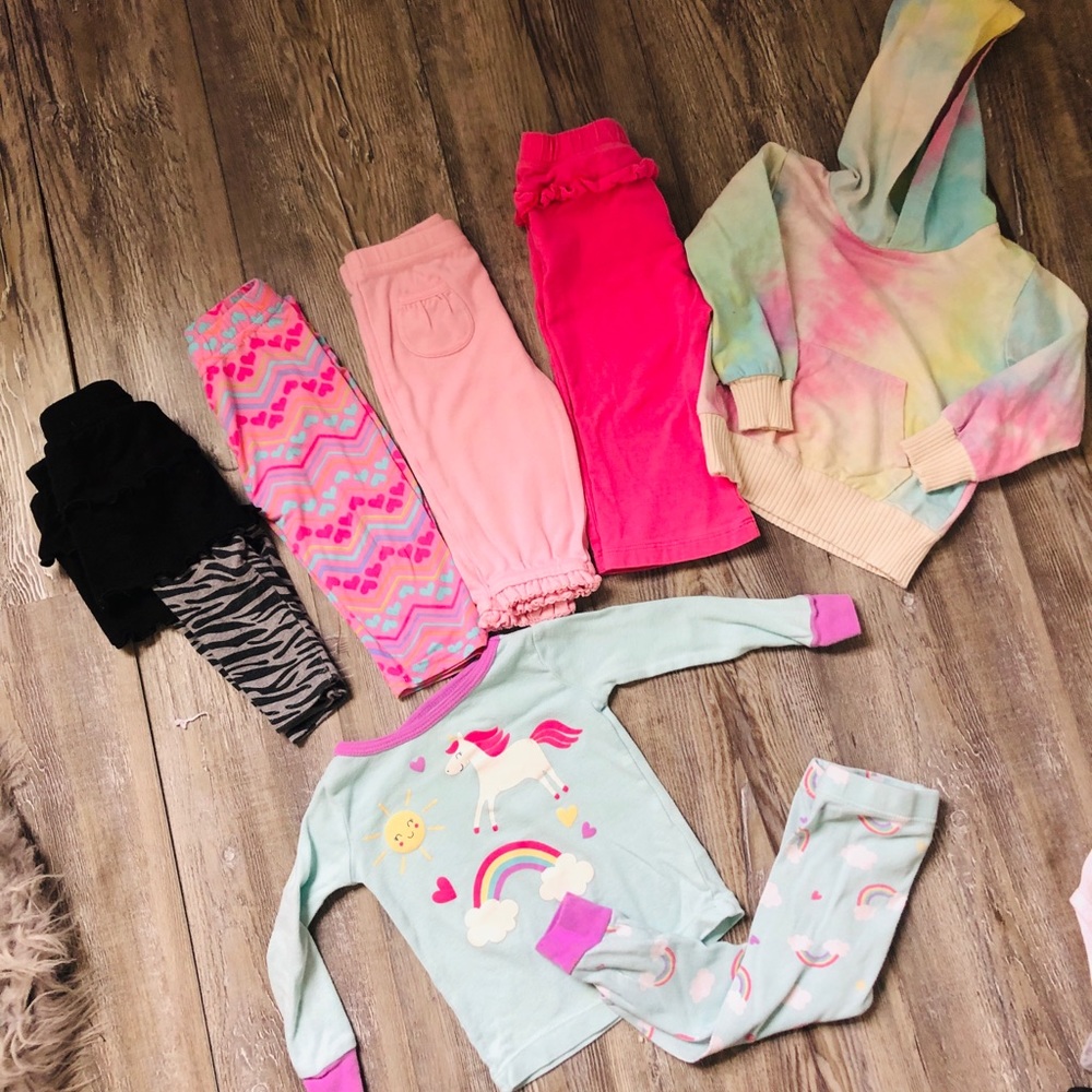 Various 12 pieces pants, shirts, dresses. 3-12 months infant girls